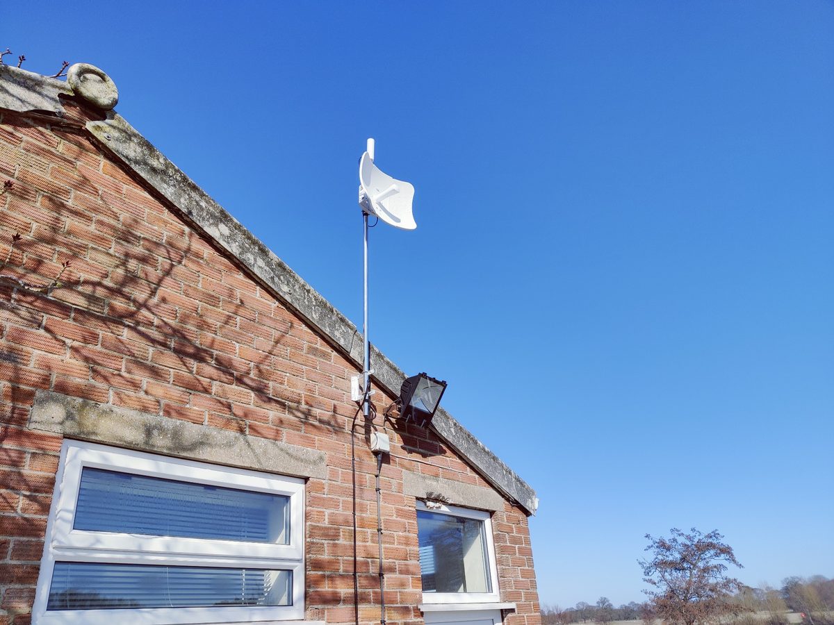 Outdoor wireless network equipment installed on a commercial building